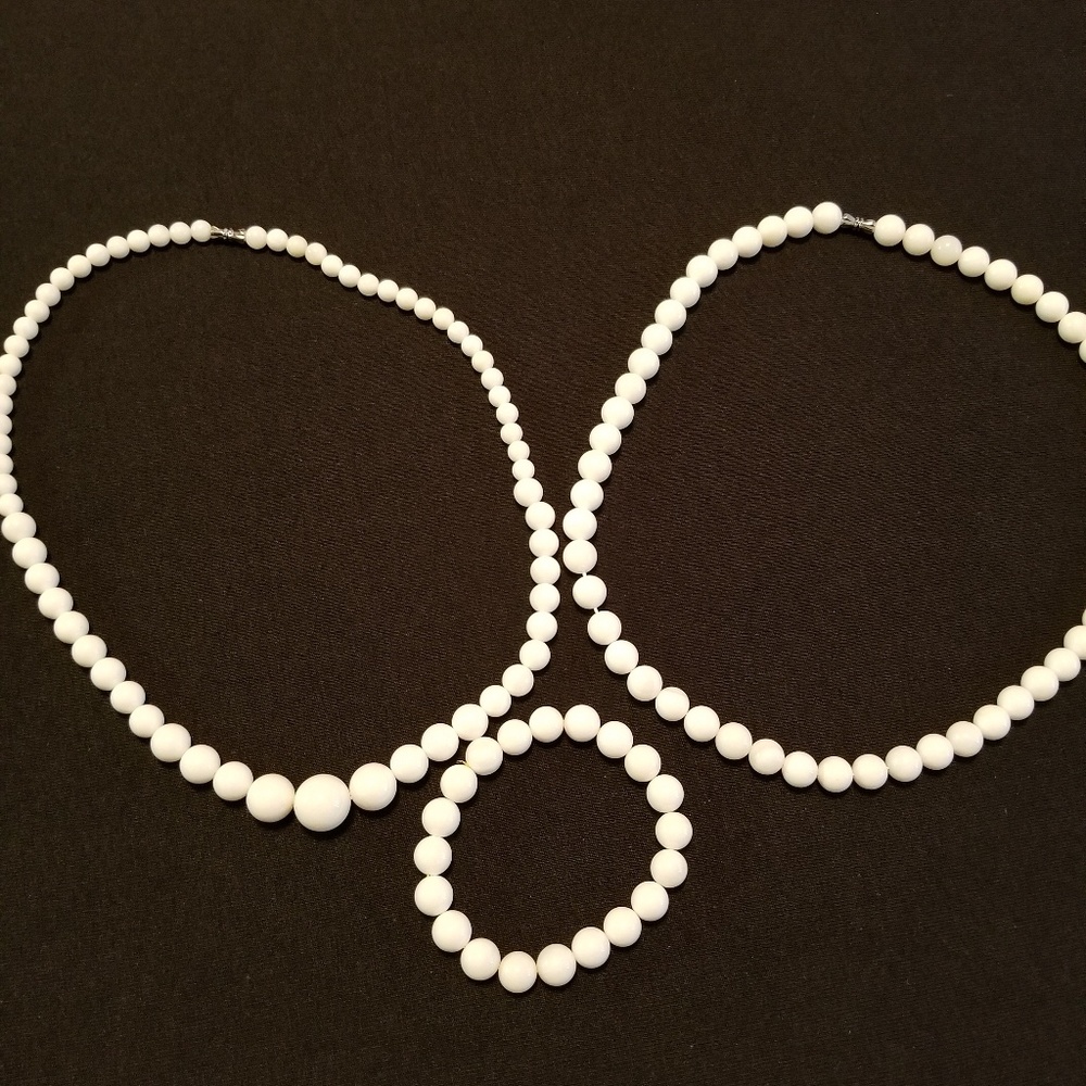 Hand carved tridacna necklaces and bracelet